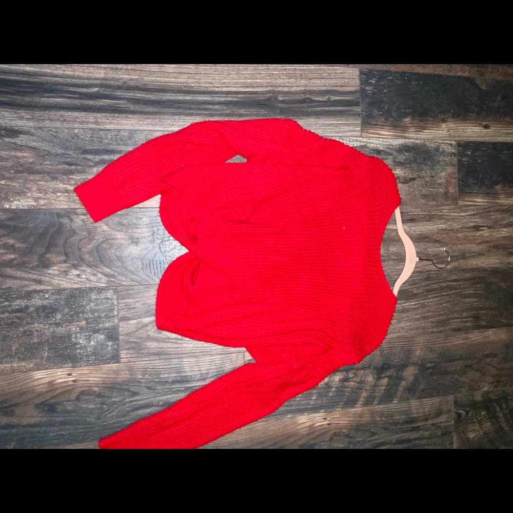 red sweater with tie back